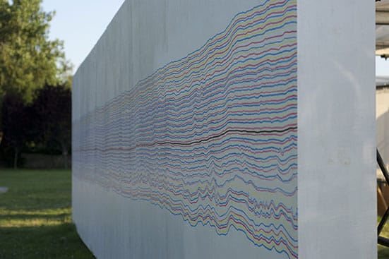 Four Exhibitions at Socrates Sculpture Park, New York — 
Sol LeWitt  ‘A black not straight line is drawn at approximately the center of the wall horizontally from side to side. Alternate yellow and blue lines are drawn above and below the black line to the top and bottom of the wall.’ Socrates Park (Photo J. Scutts)
