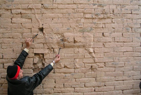 Babylon: Myth and Reality — Damage to dragon reliefs at Babylon, 2004. © John Curtis - Trustees of the British Museum