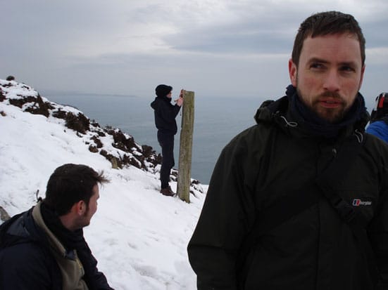 Hiking up a snow covered hill' photo Richard Whitby